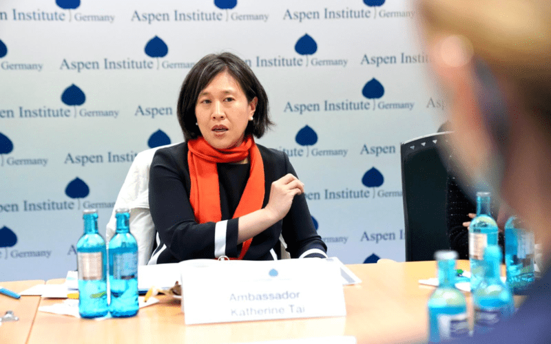 Photo of Katherine Tai speaking while gesturing with her hands.