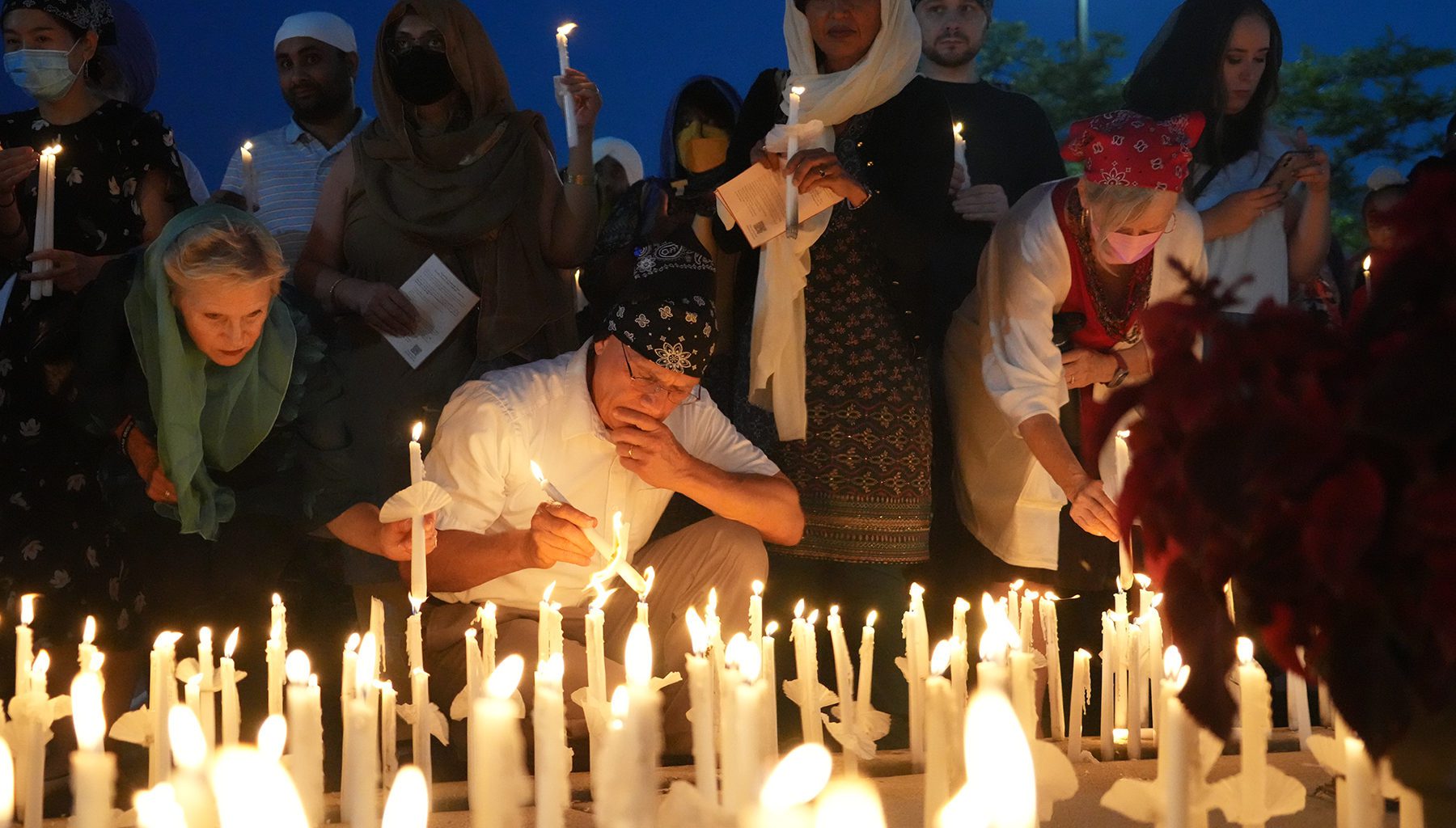 Photo of Sikh mourners lighting candles after a vigil marking the tenth anniversary of the deadly attack at the Sikh Temple in Oak Creek, Wisconsin on August 5, 2022. Photo courtesy of the Sikh Coalition.