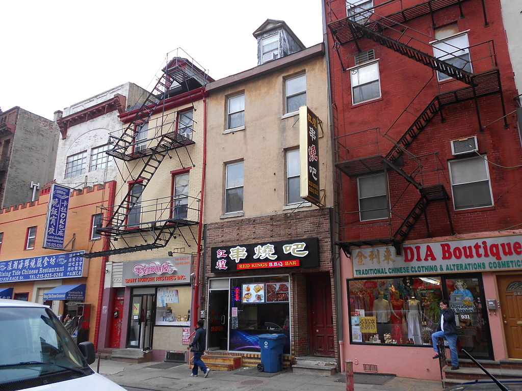 Photo of a block on Philadelphia's Chinatown showing a boutique and restaurant.