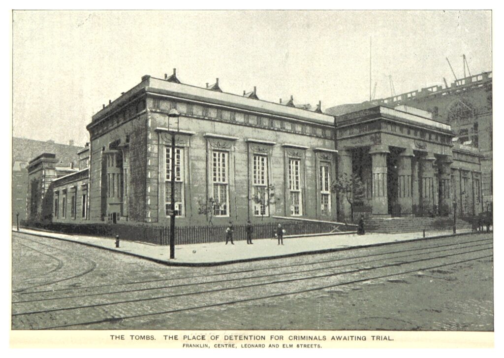 Old black-and-white photo of the original Tombs building in Manhattan