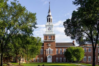 Photo of a clock tower at Dartmouth College, which recently reinstated standardized testing requirements.
