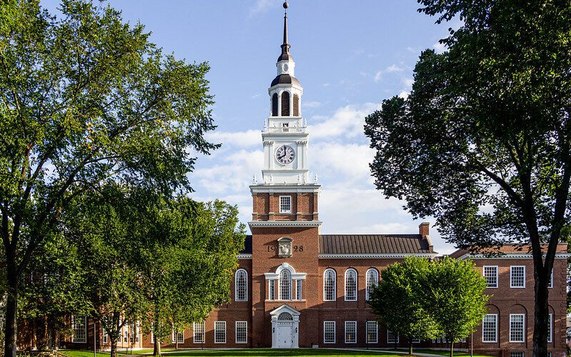 Photo of a clock tower at Dartmouth College, which recently reinstated standardized testing requirements.