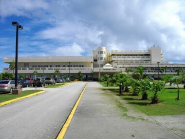 Photo of a pathway leading to the entrance of the Guam Memorial Hospital building