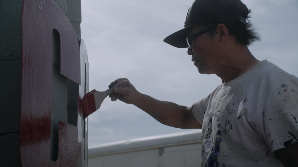Photo of Chinese dissident Weiming Chen painting