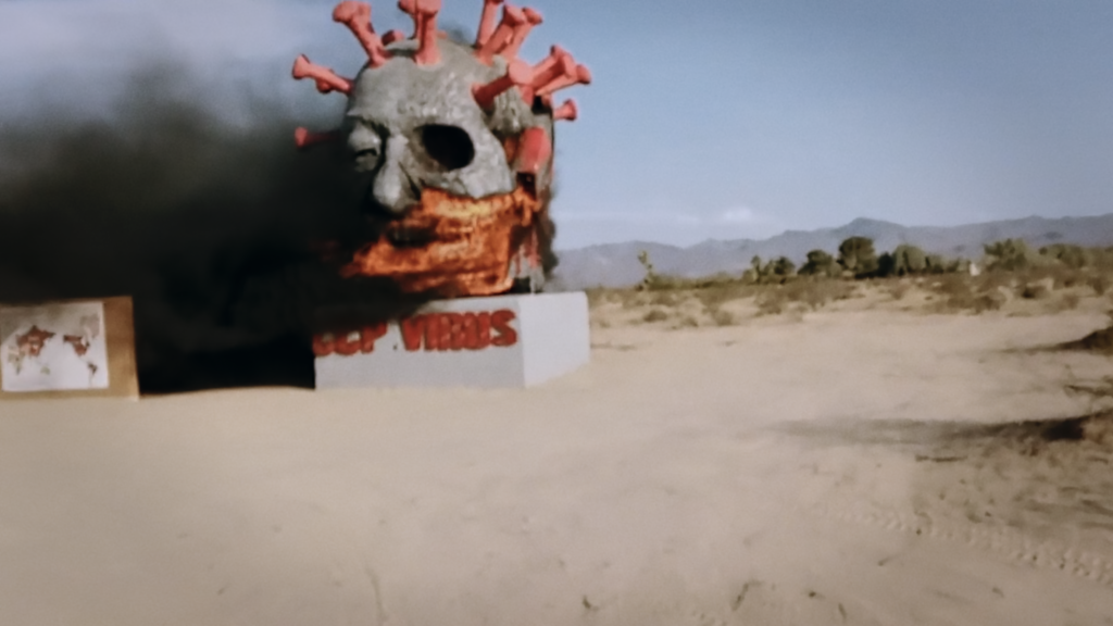 Photo of a COVID sculpture on fire