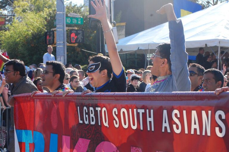 Photo of South Asians in Atlanta, Georgia carrying a sign in support of LGBTQ rights