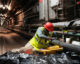 A contractor applies a protective coating of paint to a pipe inside the Red Hill Bulk Fuel Storage Facility in Honolulu, Aug. 14, 2026. Photo: U.S. Navy