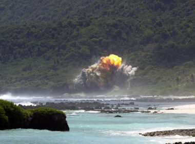 A fireball rises above the 36th Explosive Ordnance Disposal (EOD) Tarague range seconds after the detonation of an M117 bomb, as a part of the flight's training, on Andersen Air Force Base (AFB), Guam.