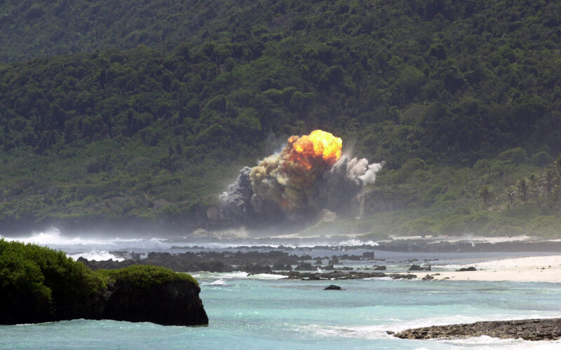 A fireball rises above the 36th Explosive Ordnance Disposal (EOD) Tarague range seconds after the detonation of an M117 bomb, as a part of the flight's training, on Andersen Air Force Base (AFB), Guam.