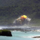 A fireball rises above the 36th Explosive Ordnance Disposal (EOD) Tarague range seconds after the detonation of an M117 bomb, as a part of the flight's training, on Andersen Air Force Base (AFB), Guam.